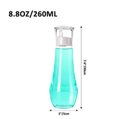 Set of two glass mouthwash bottles