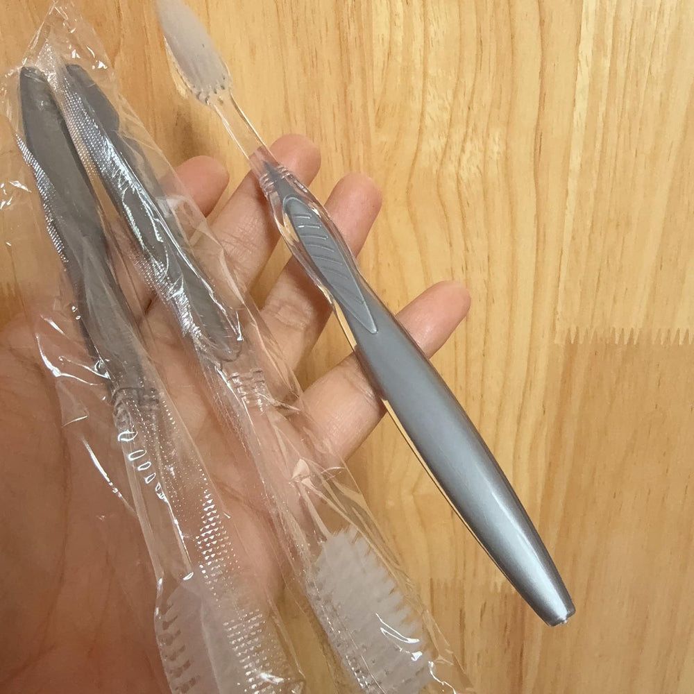 Bulk 100-pack of disposable toothbrushes for home and travel