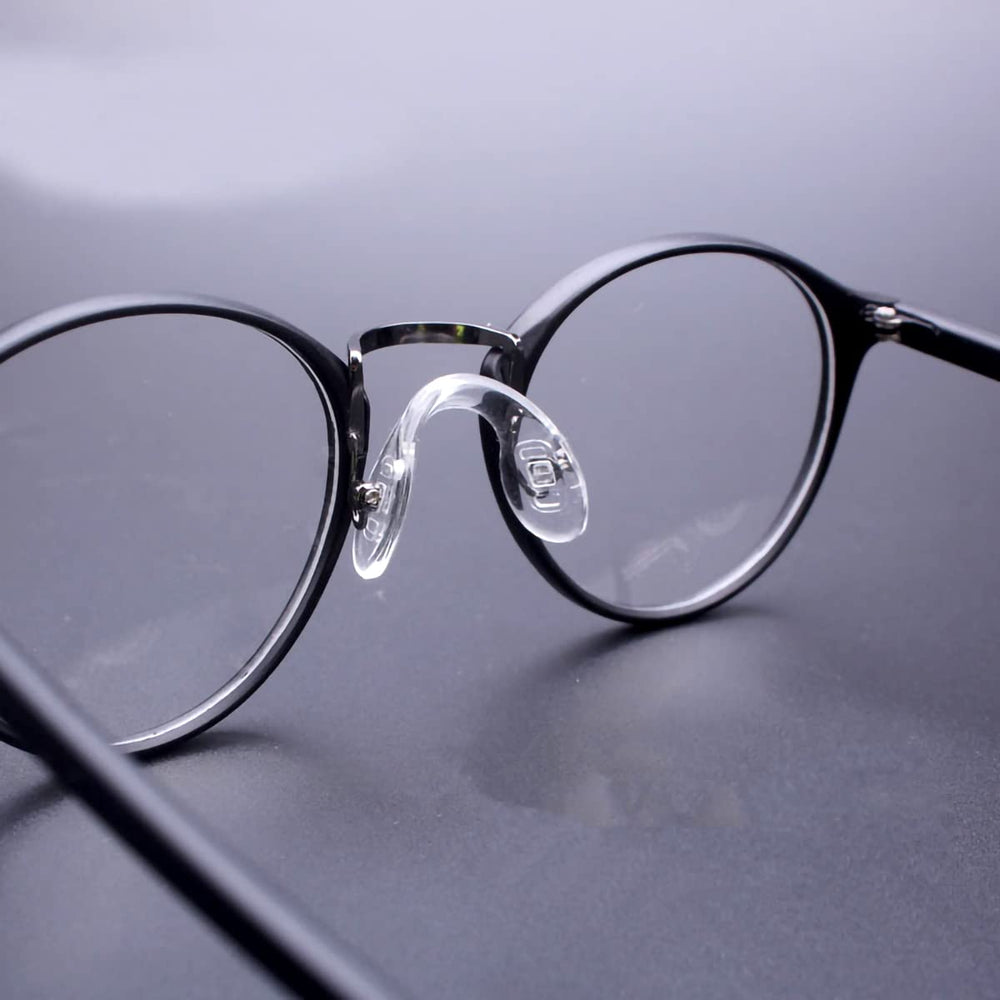 Eyewear with larger contact surface nose pads for comfort