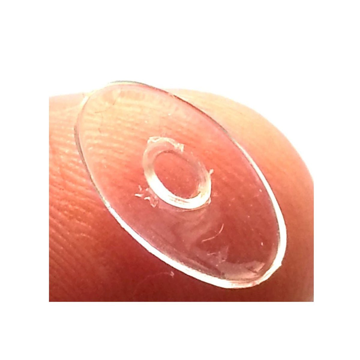 Close-up of 10 pairs of oval silicone nose pads for glasses