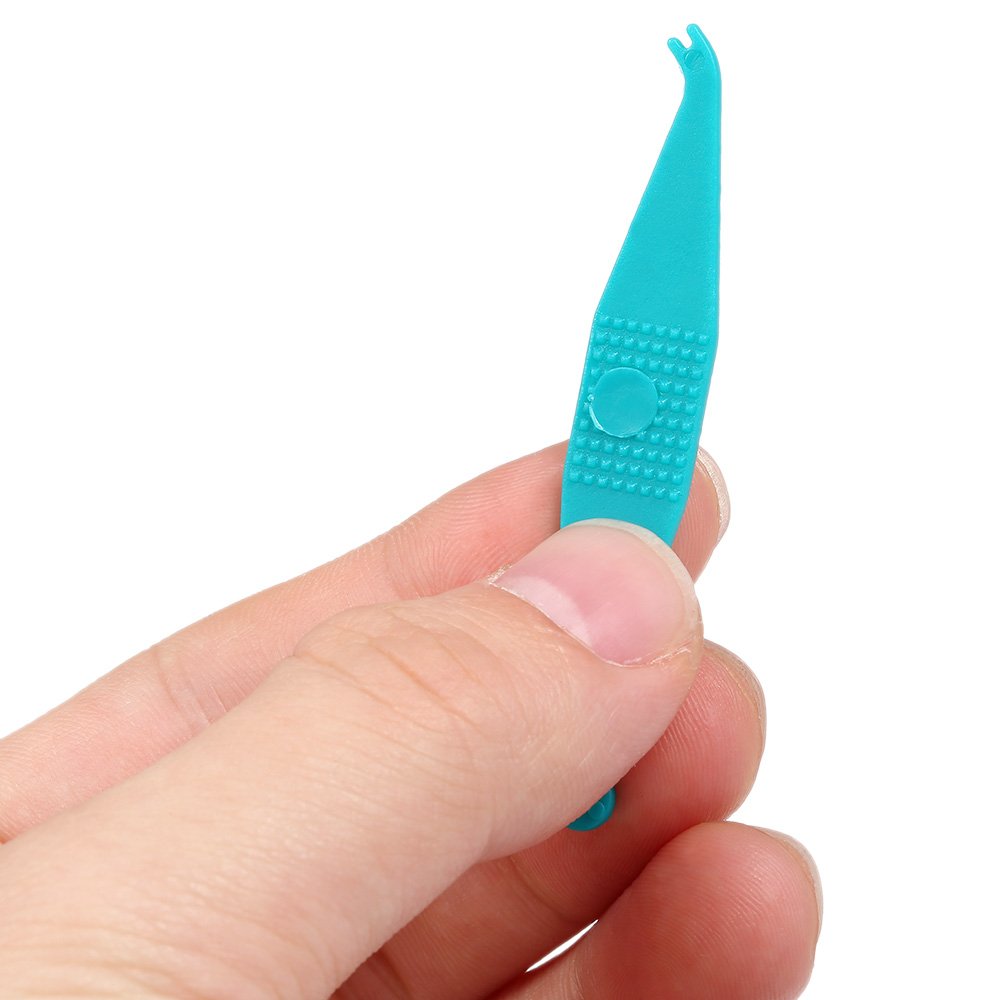 Elastic ligature ties for braces in packaging