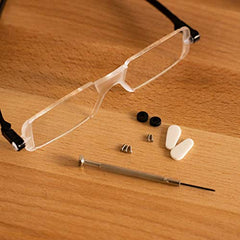 Universal eyeglasses repair kit components laid out