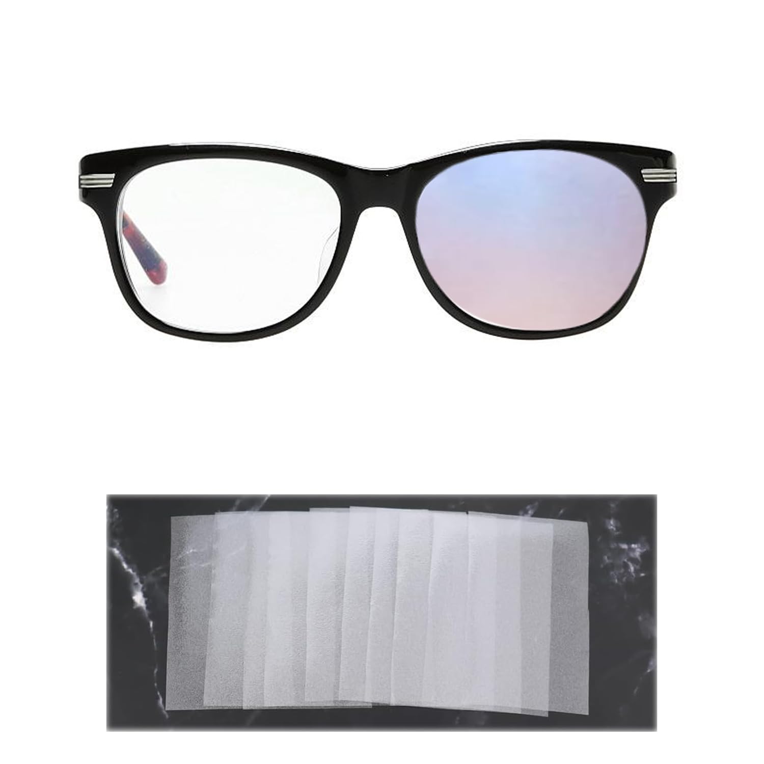 Eye patch being trimmed with scissors to fit glasses lenses