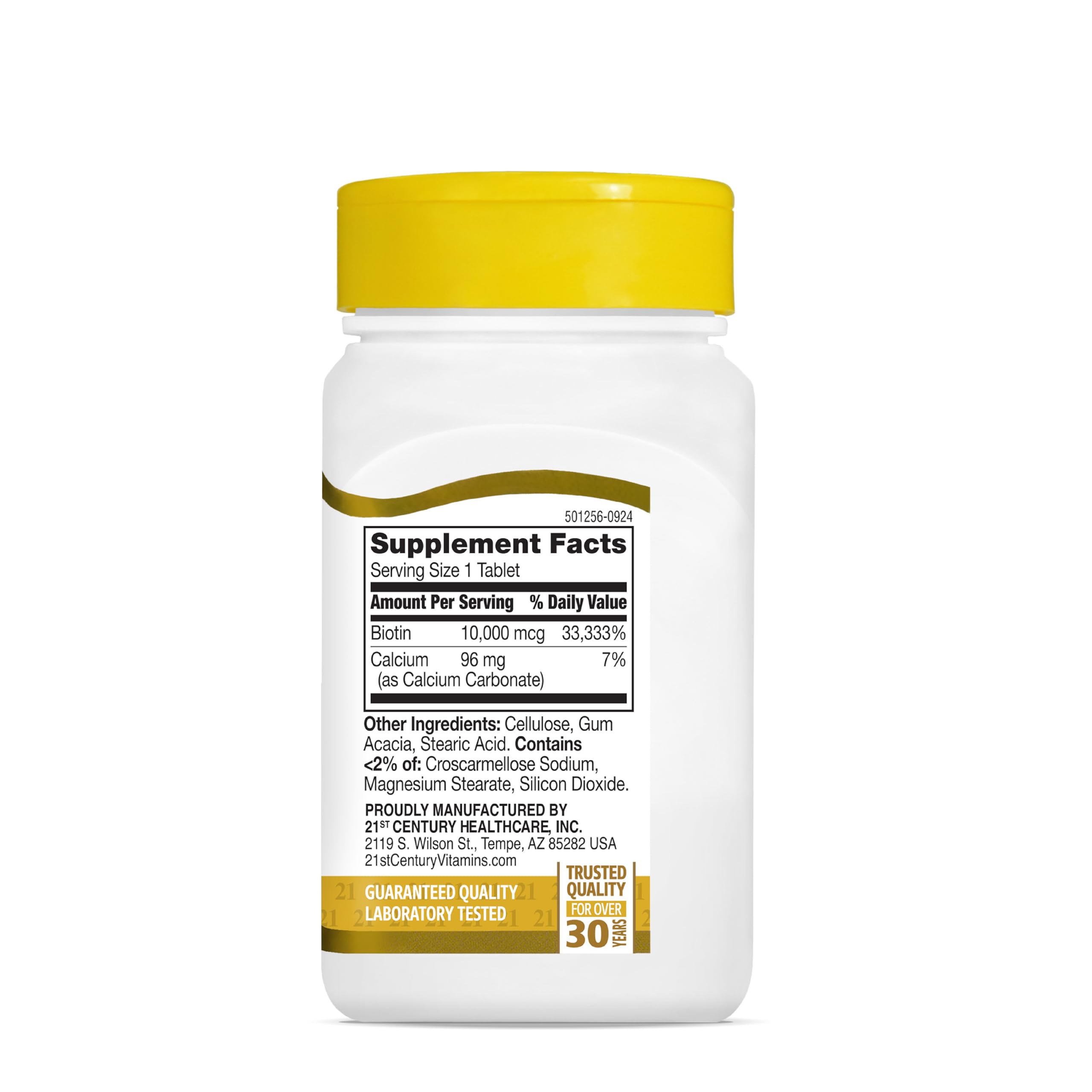 Biotin tablets in glass bottle with label visible