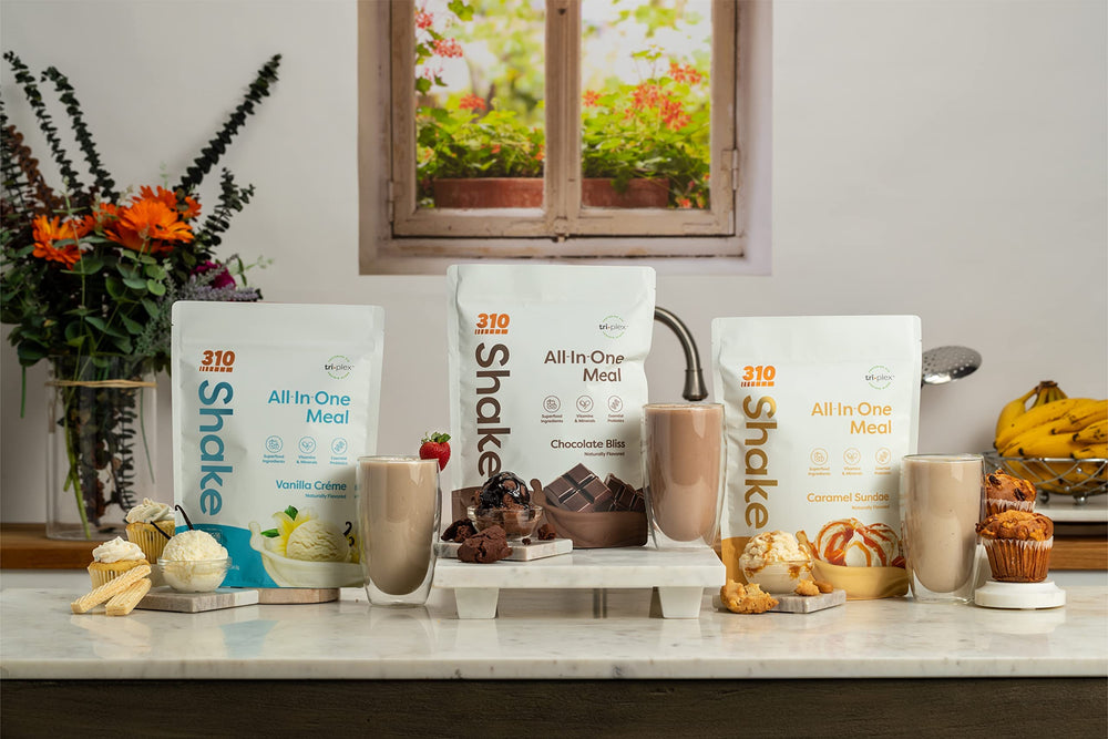 310 Nutrition morning routine shake in hand for a quick breakfast