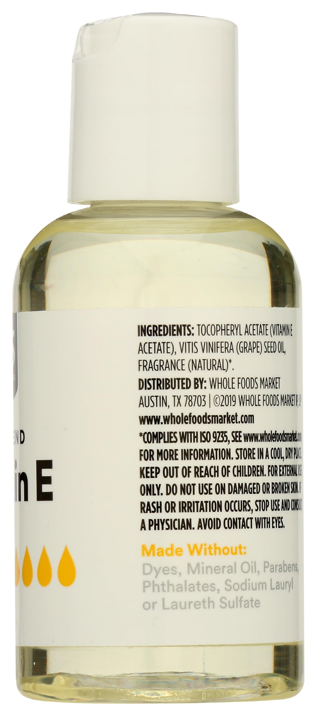 365 Vitamin E Skin Oil cap—free from artificial dyes.