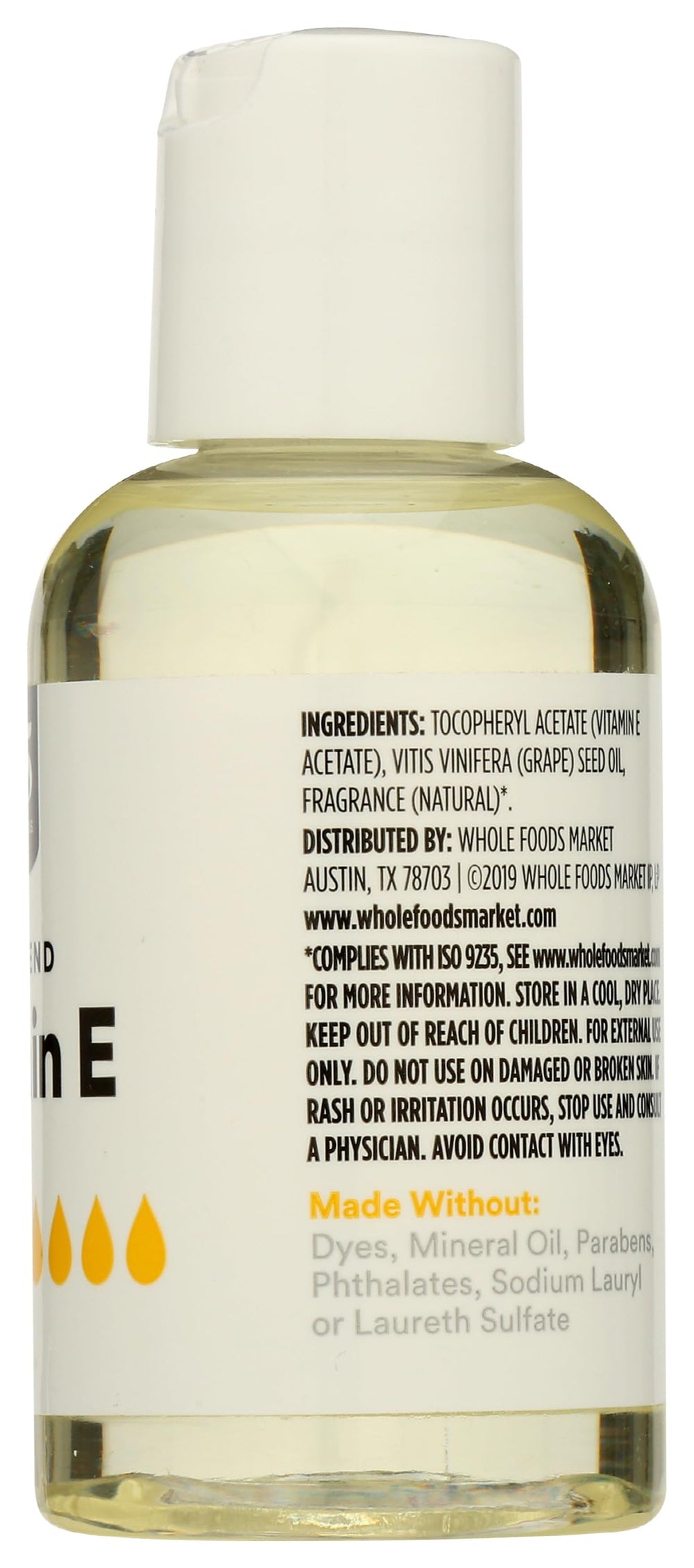365 Vitamin E Skin Oil cap—free from artificial dyes.