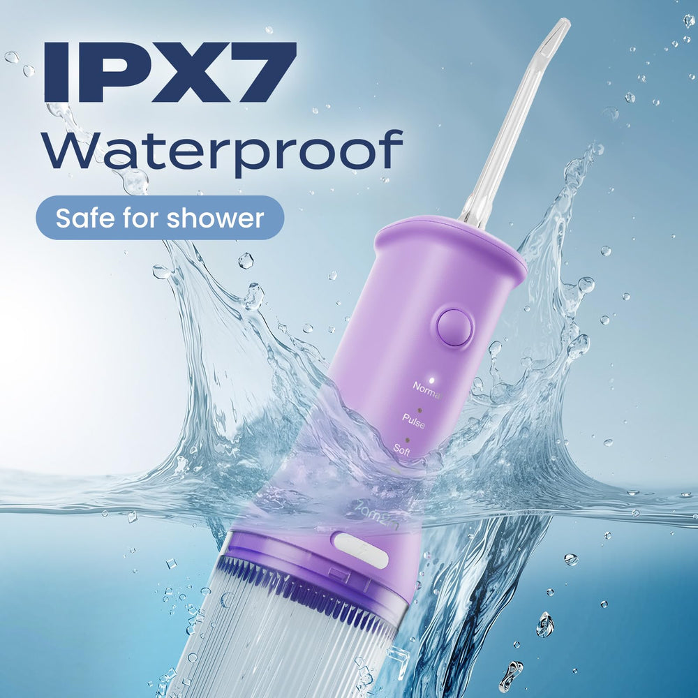 User using 7AM2M purple water flosser during travel