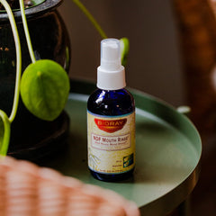 Graphic highlighting NDF Mouth Rinse benefits: binds toxins and supports gum health