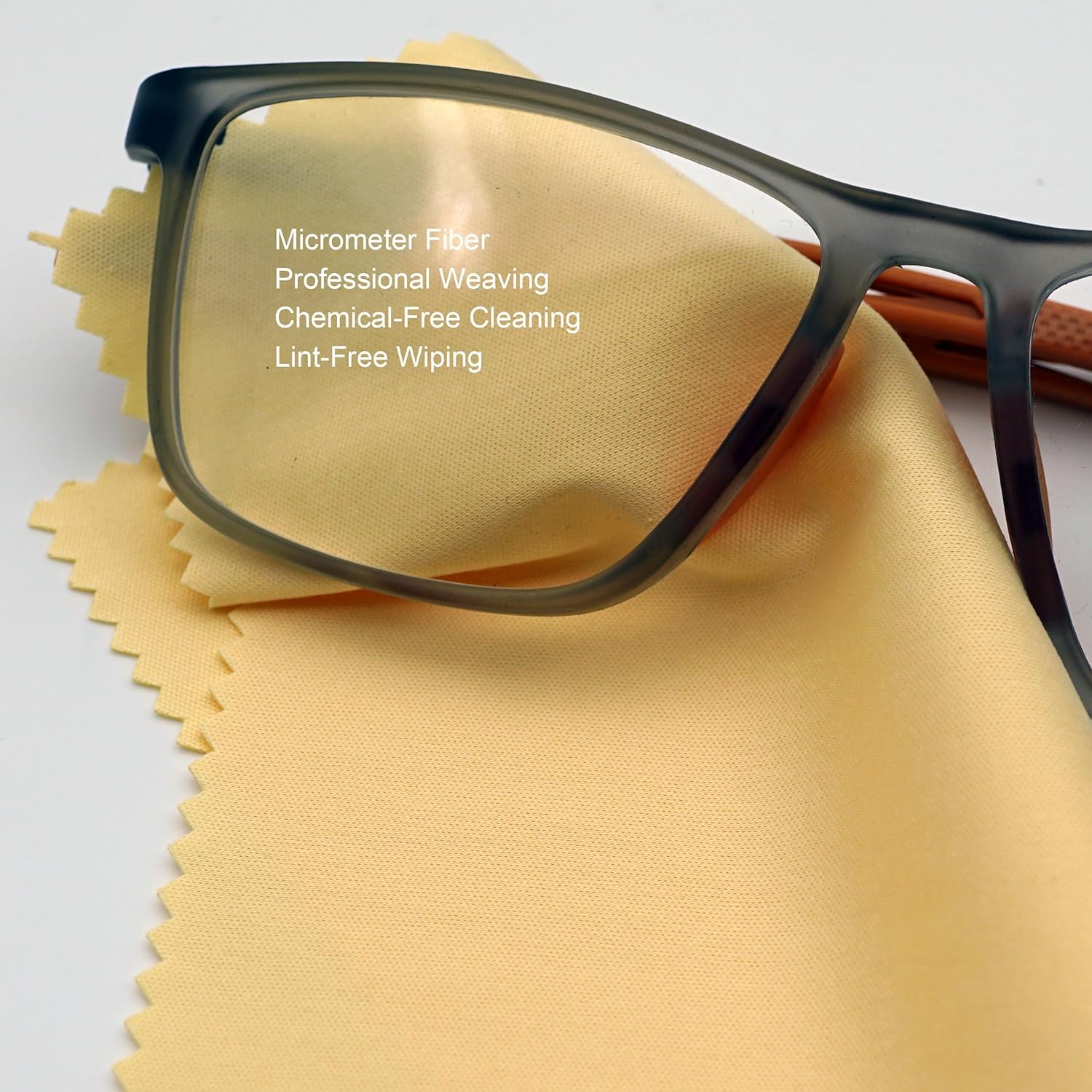 Person cleaning eyeglasses with AAwipes microfiber cloth