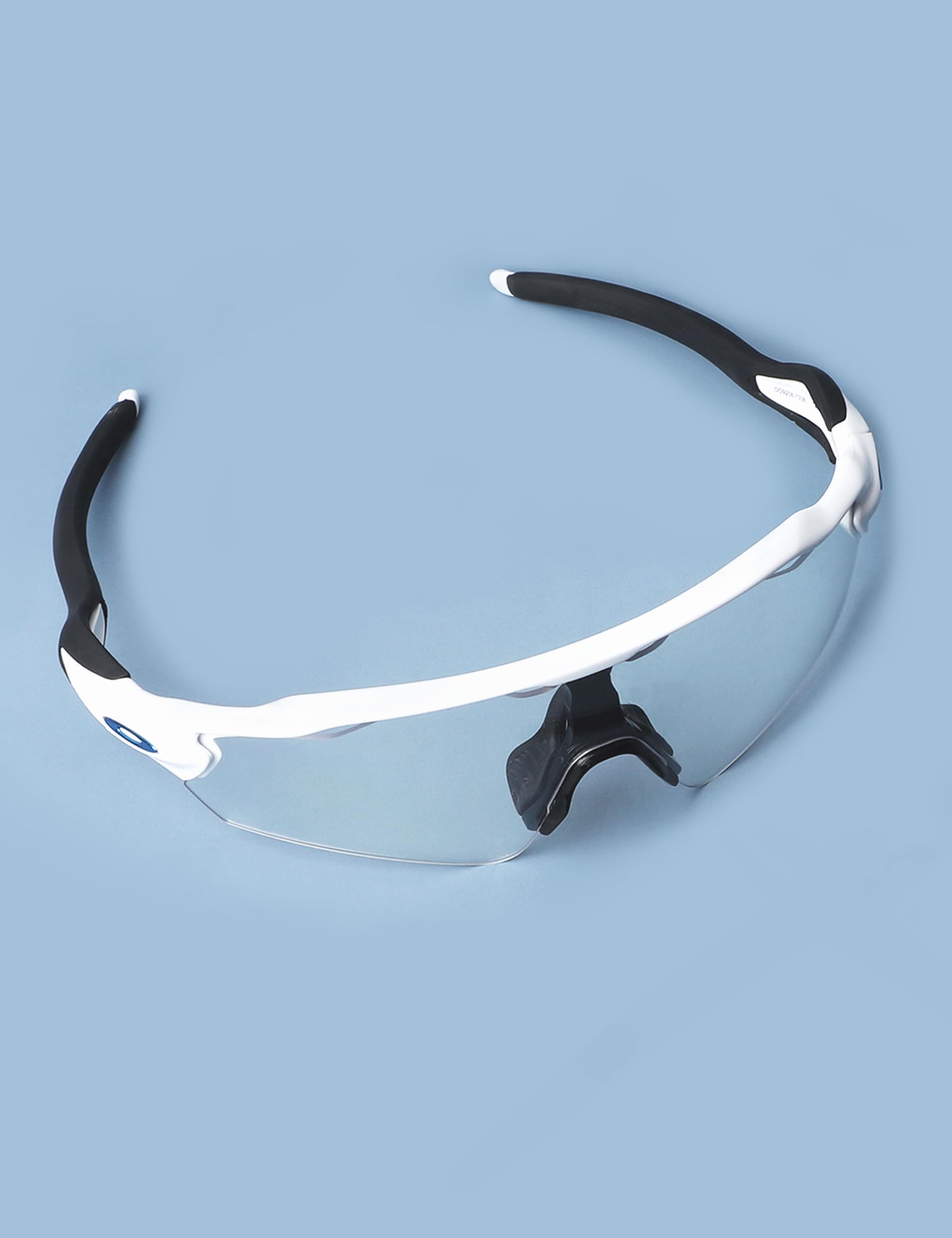Lifestyle shot of Oakley sunglasses secured with Acefrog earsocks