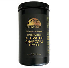 Activated hardwood charcoal powder in a glass jar (hero image)
