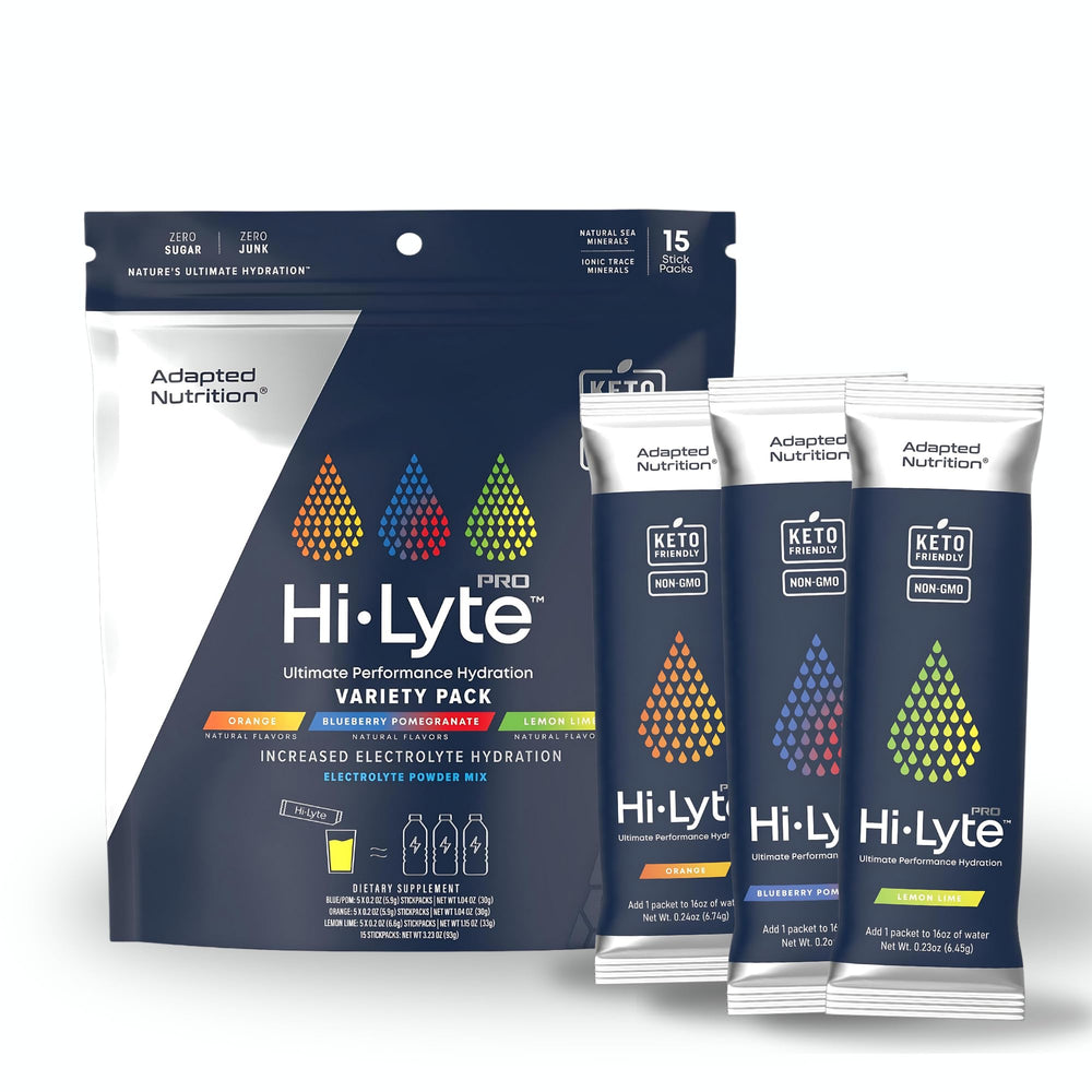 Adapted Nutrition Hi-Lyte Pro packets on table for on-the-go hydration.