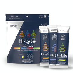 Adapted Nutrition Hi-Lyte Pro packets on table for on-the-go hydration.