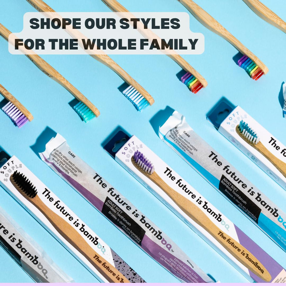 Adult brushing teeth with bamboo toothbrush