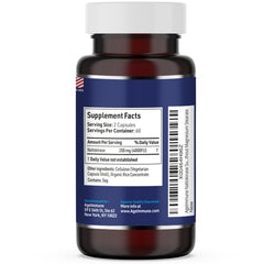 Close-up of nattokinase bottle label showing strength and serving size