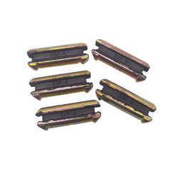 Close-up of yellow flex replacement pins for 23/230 bucket teeth