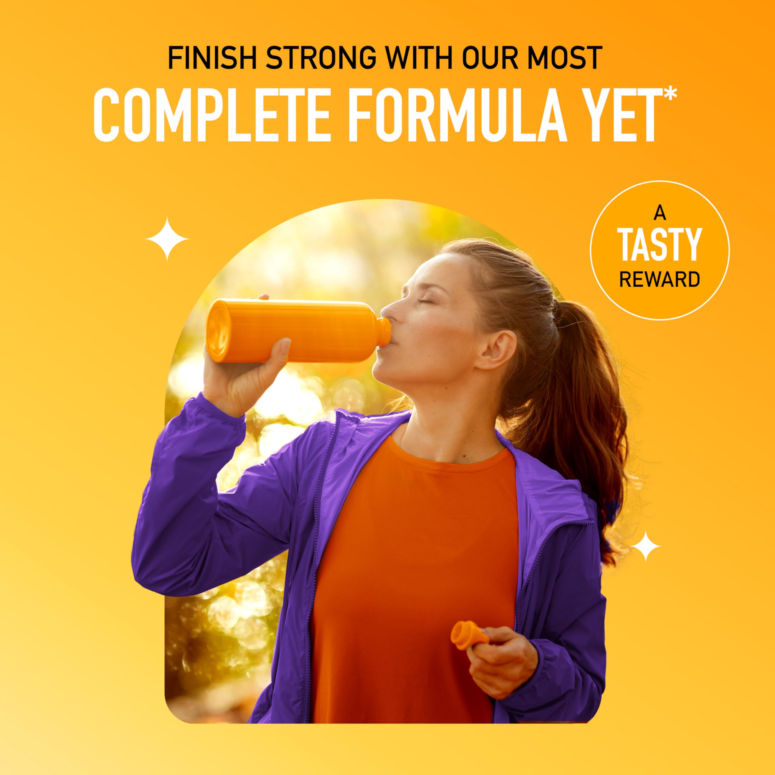 Airborne fizzing tablet in a glass with sparkling water.