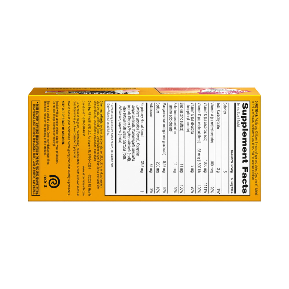 Airborne immune tablets shown with glass of water