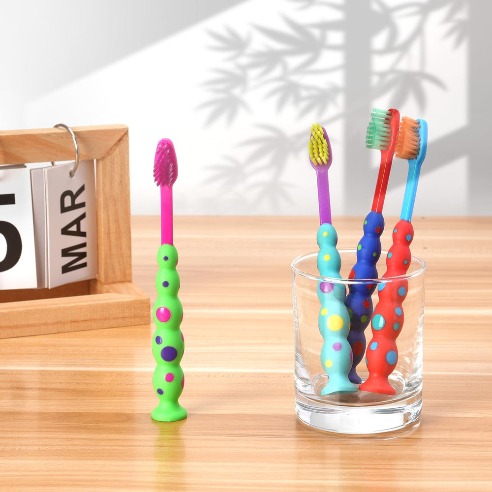 Kids toothbrush featuring a suction cup design