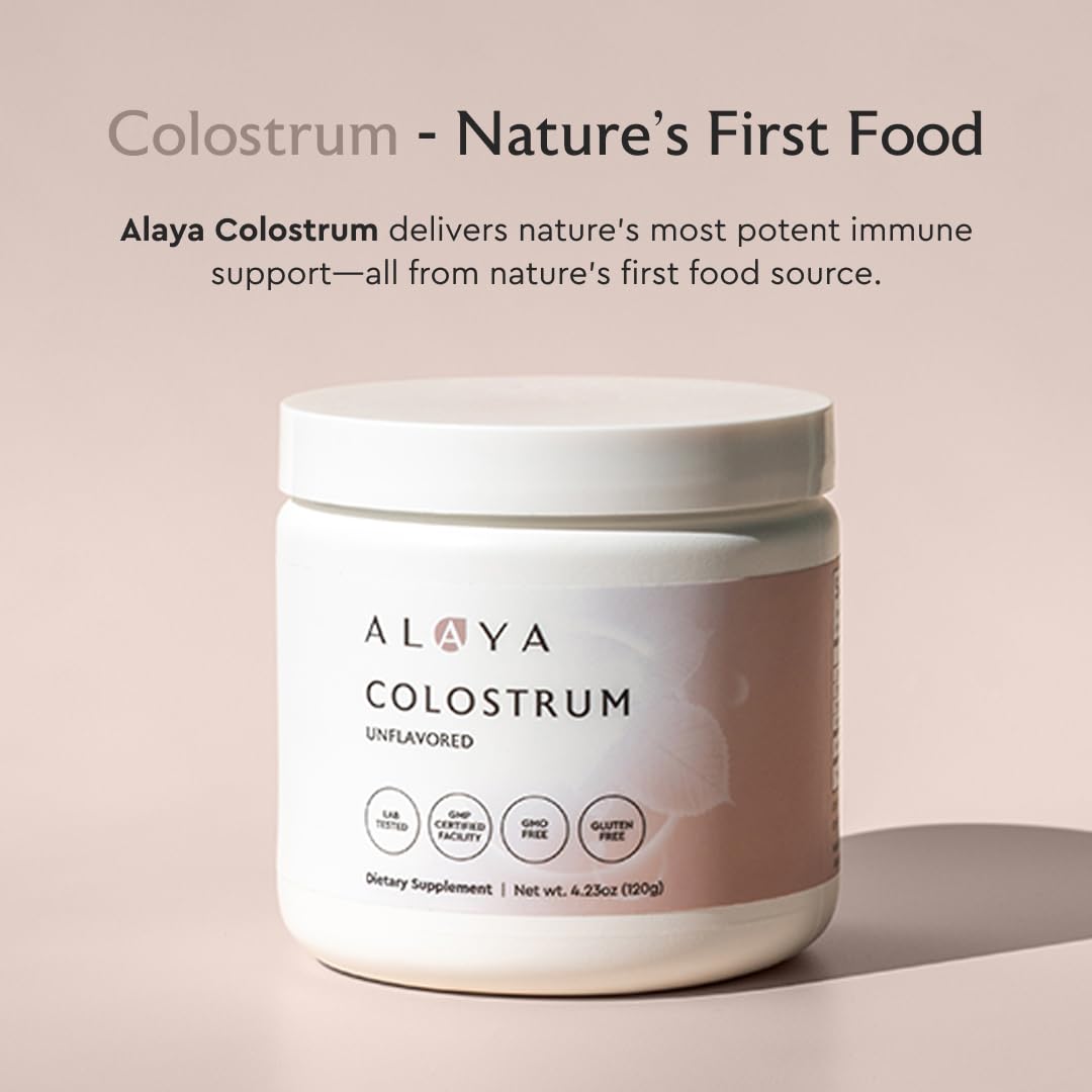 Serving scoop of Alaya Colostrum Powder