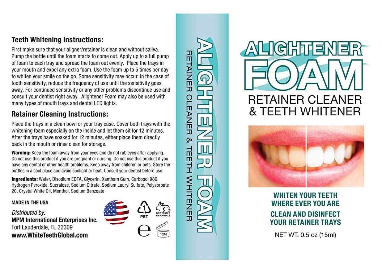 Whitening foam shown with clear dental aligners