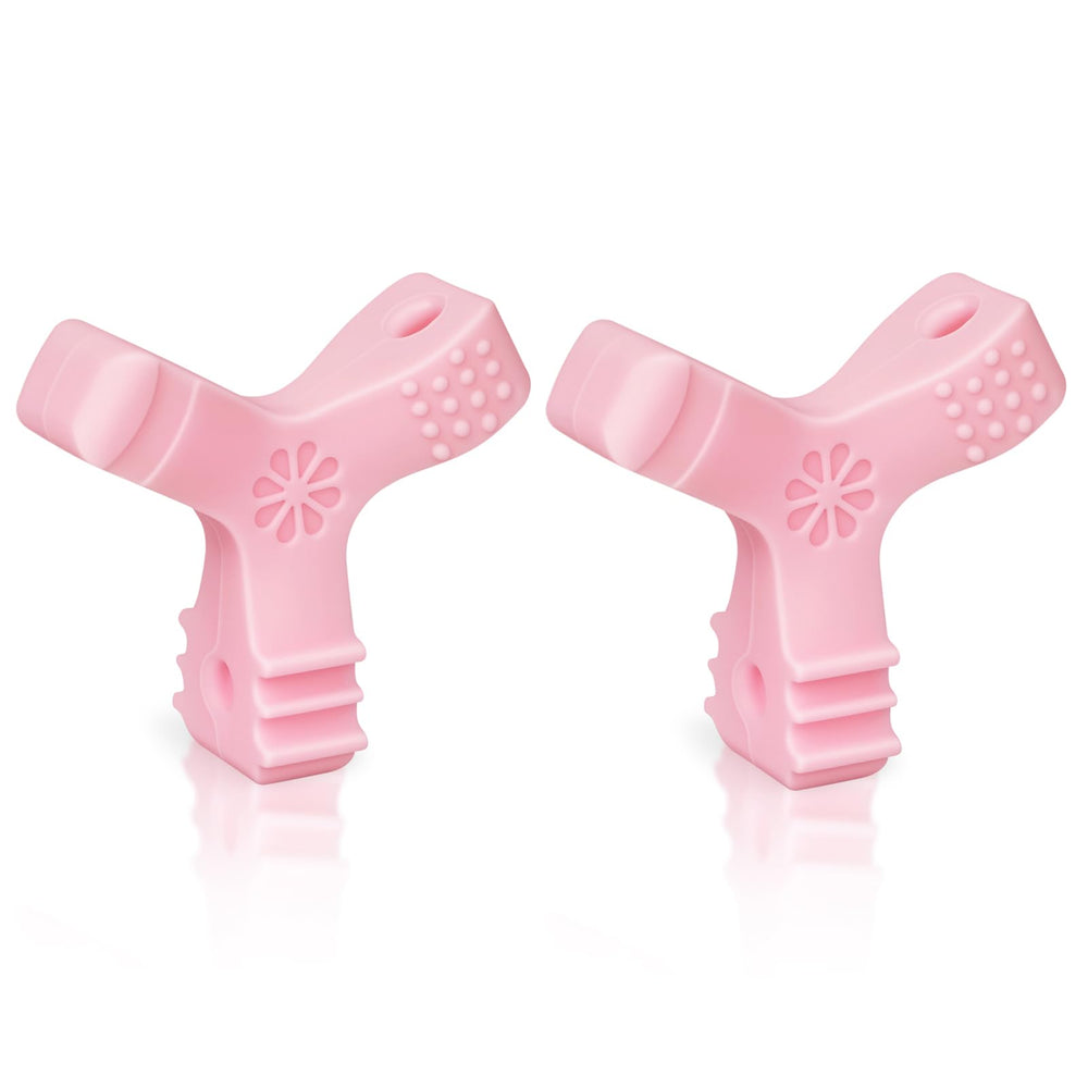 Pink Aligner Chewies being cleaned in an ultrasonic cleaner