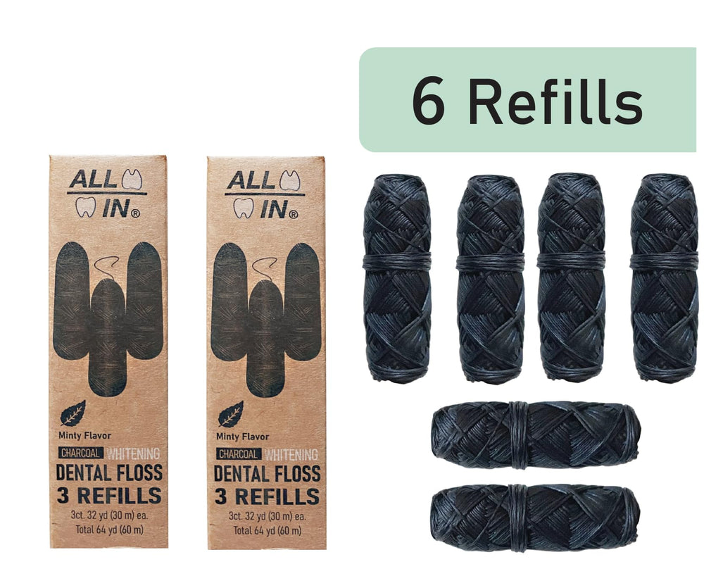 Waxed charcoal floss detail showing natural candelilla wax