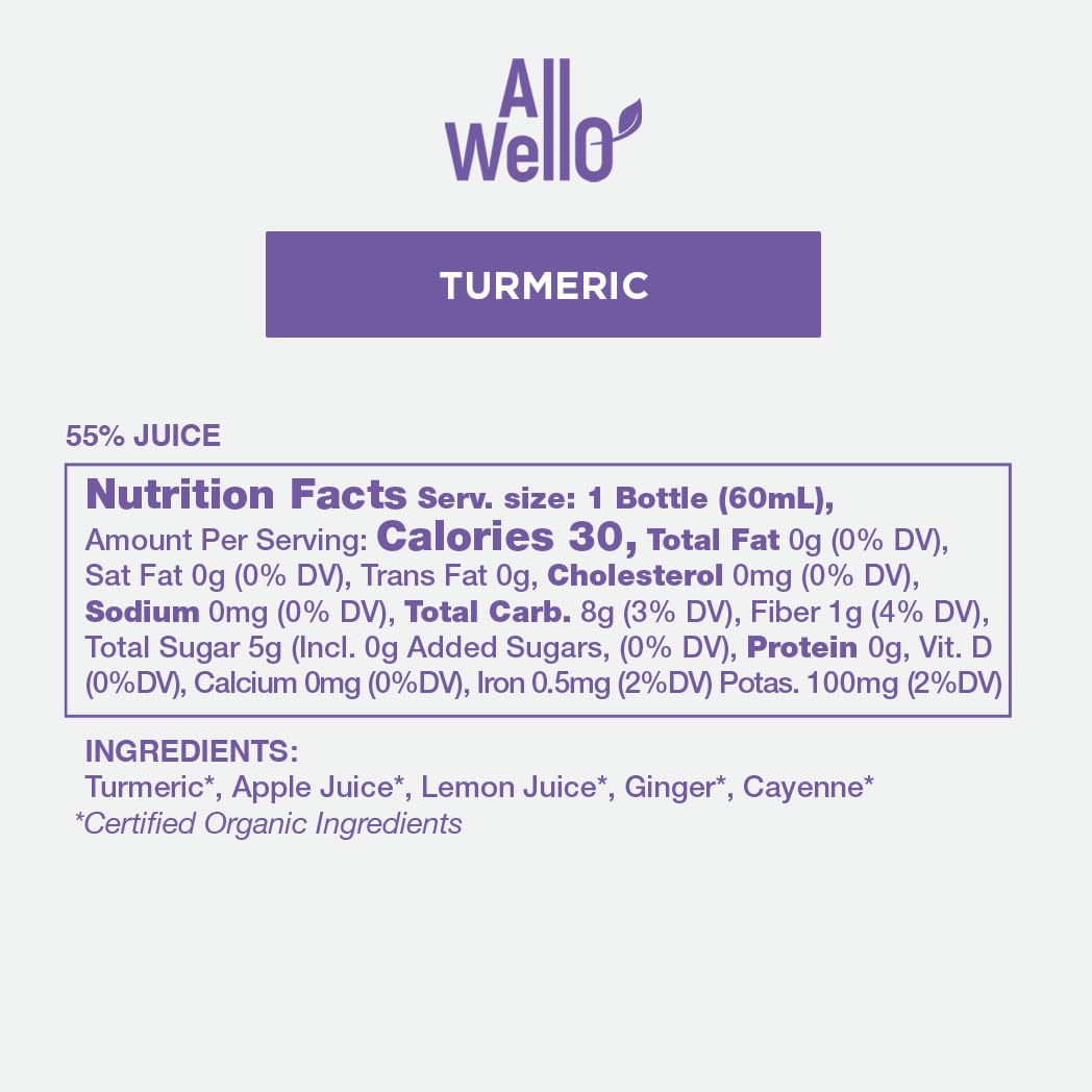 Close-up of ingredients: ginger, lemon, apple juice, cayenne