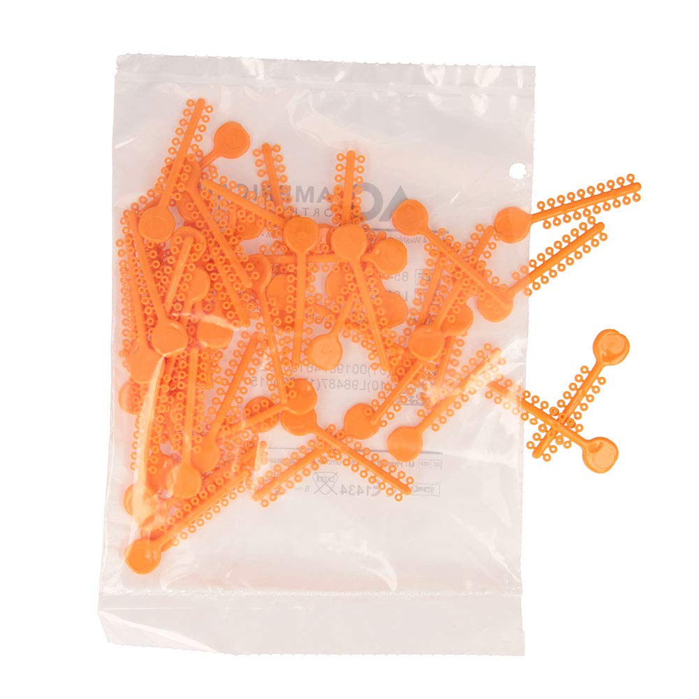 Close-up of orange ligature sticks