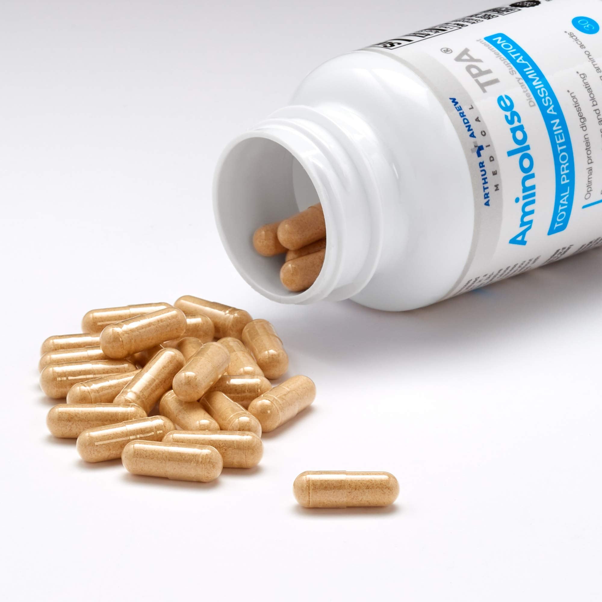 Vegan and Non-GMO icons on Aminolase TPA packaging