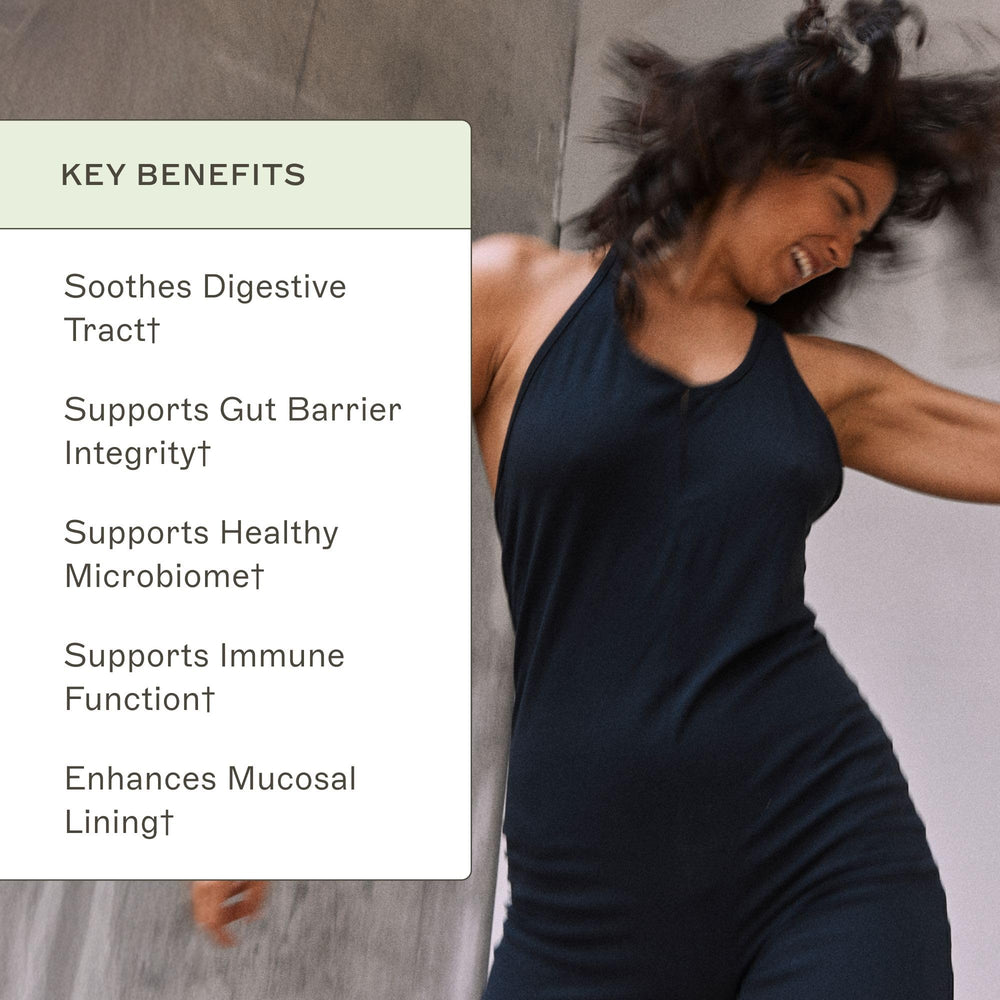 Pouring Leaky Gut Revive powder into water for mixing