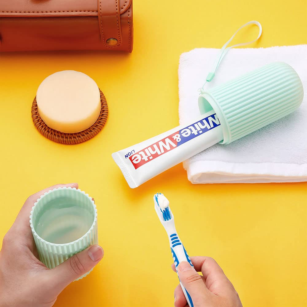 Travel-friendly denture cleaning kit with covers and cup holder
