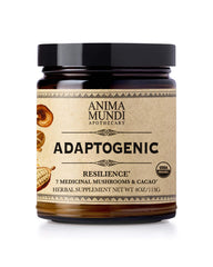 Jar of Anima Mundi Organic Mushroom Supplement with scoop