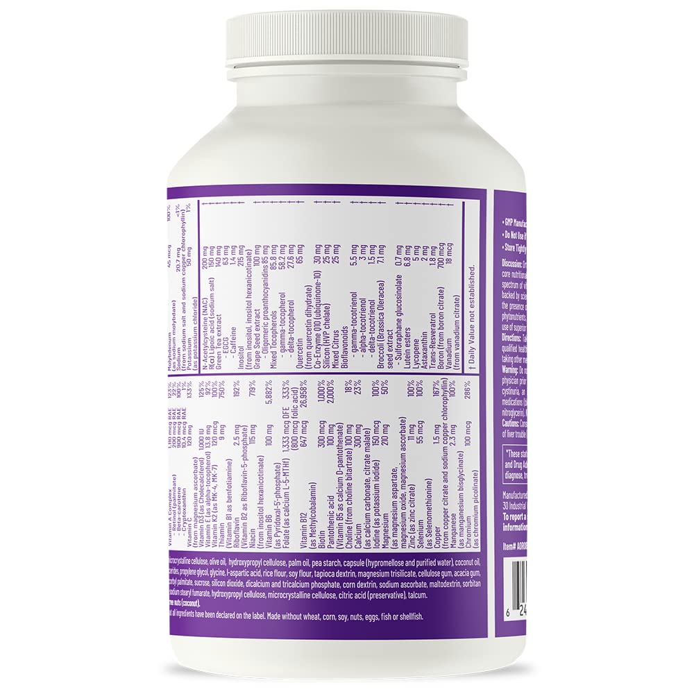 Close-up of vegan multivitamin packaging and capsules