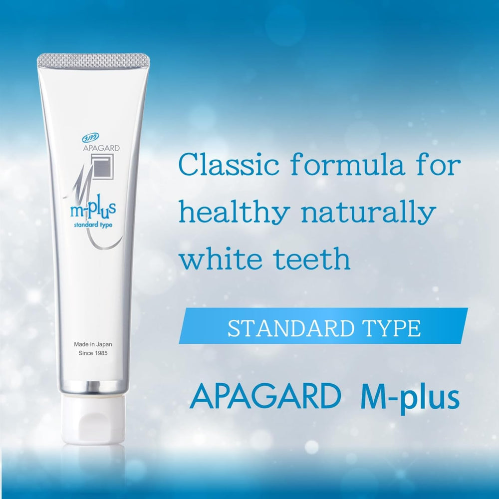 Close-up of APAGARD M-Plus toothpaste packaging and label for fluoride-free formula