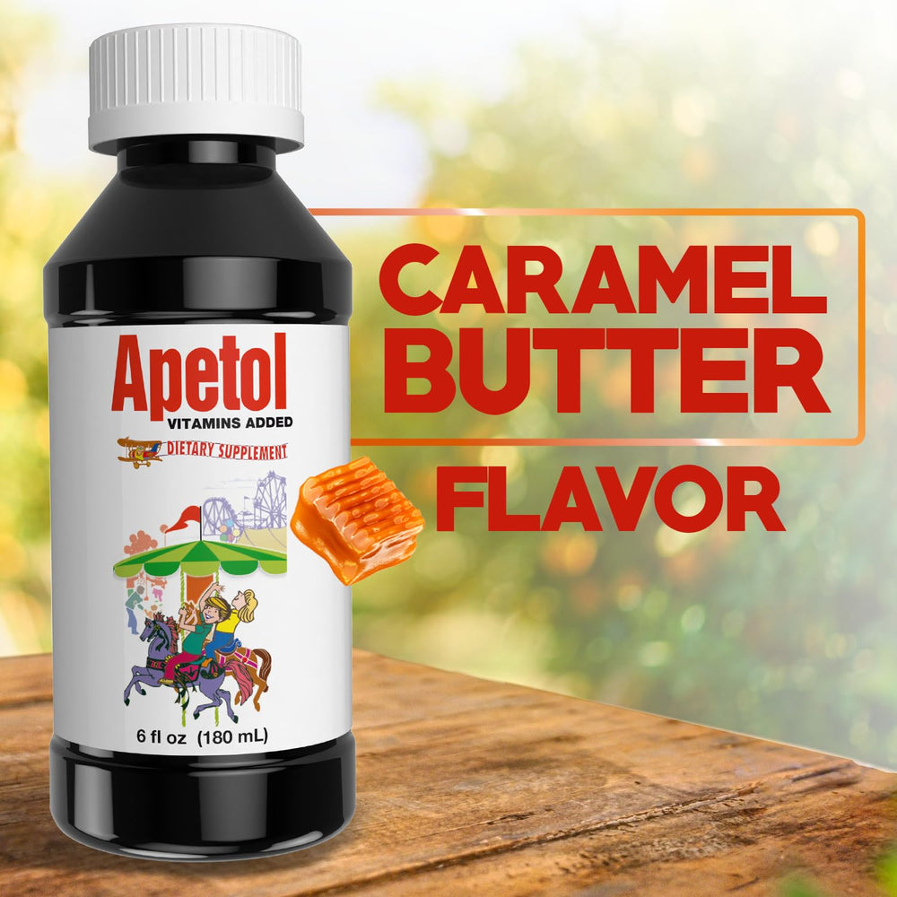 Poured Apetol liquid supplement beside a glass of water