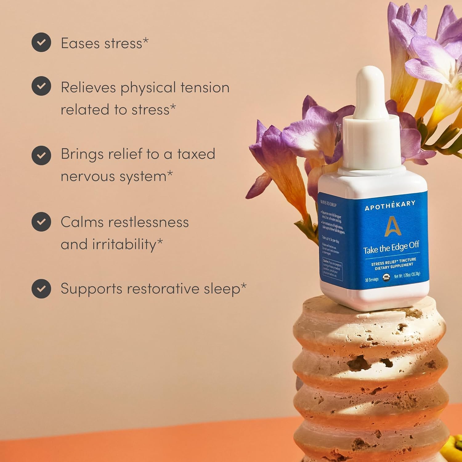 GMO-free plant-based wellness label on Apothékary bottle