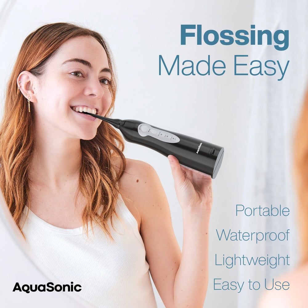 Side profile of AquaSonic Aqua Flosser with tip attachments