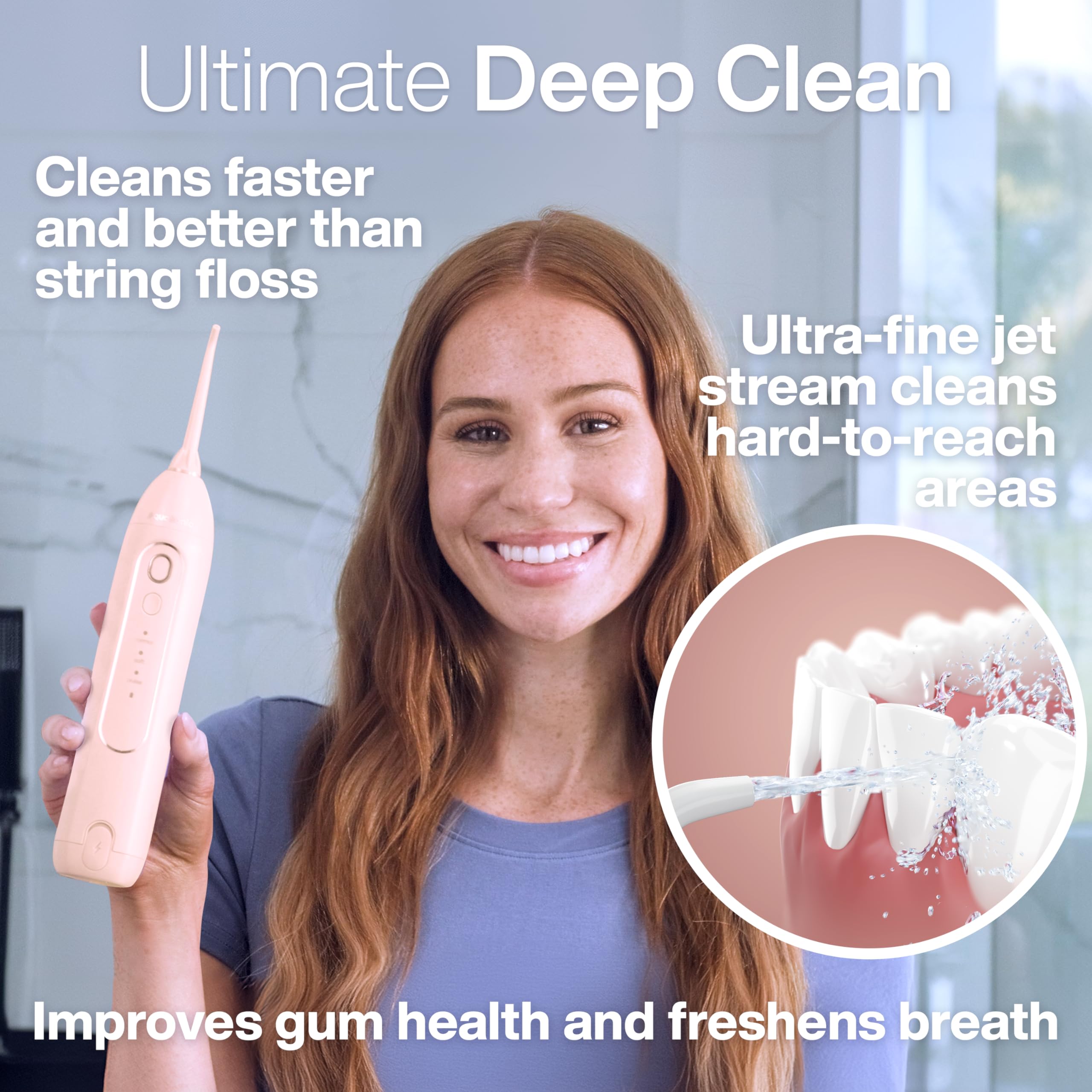 Close-up of water flossing action beside a toothbrush