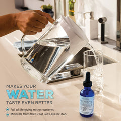 Pouring mineral water from AquaTru Perfect Minerals
