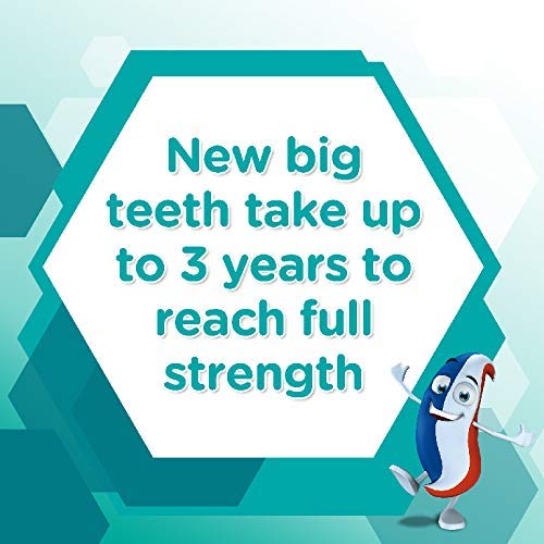 Child squeezing Aquafresh My Big Teeth toothpaste