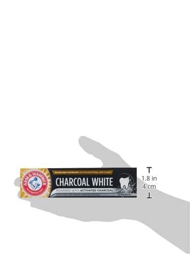 Smiling person with brighter teeth using Arm & Hammer Charcoal White toothpaste