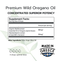 Organic olive oil being used to dilute oregano oil in the bottle