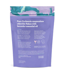 Close-up of dissolving bath flakes in warm water with lavender aroma