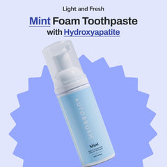 Close-up of mint-flavored foaming toothpaste texture