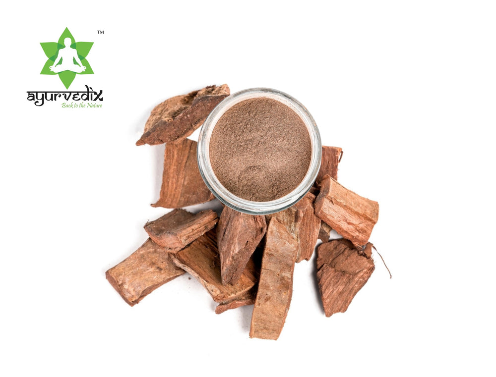 Arjuna bark powder in wooden scoop