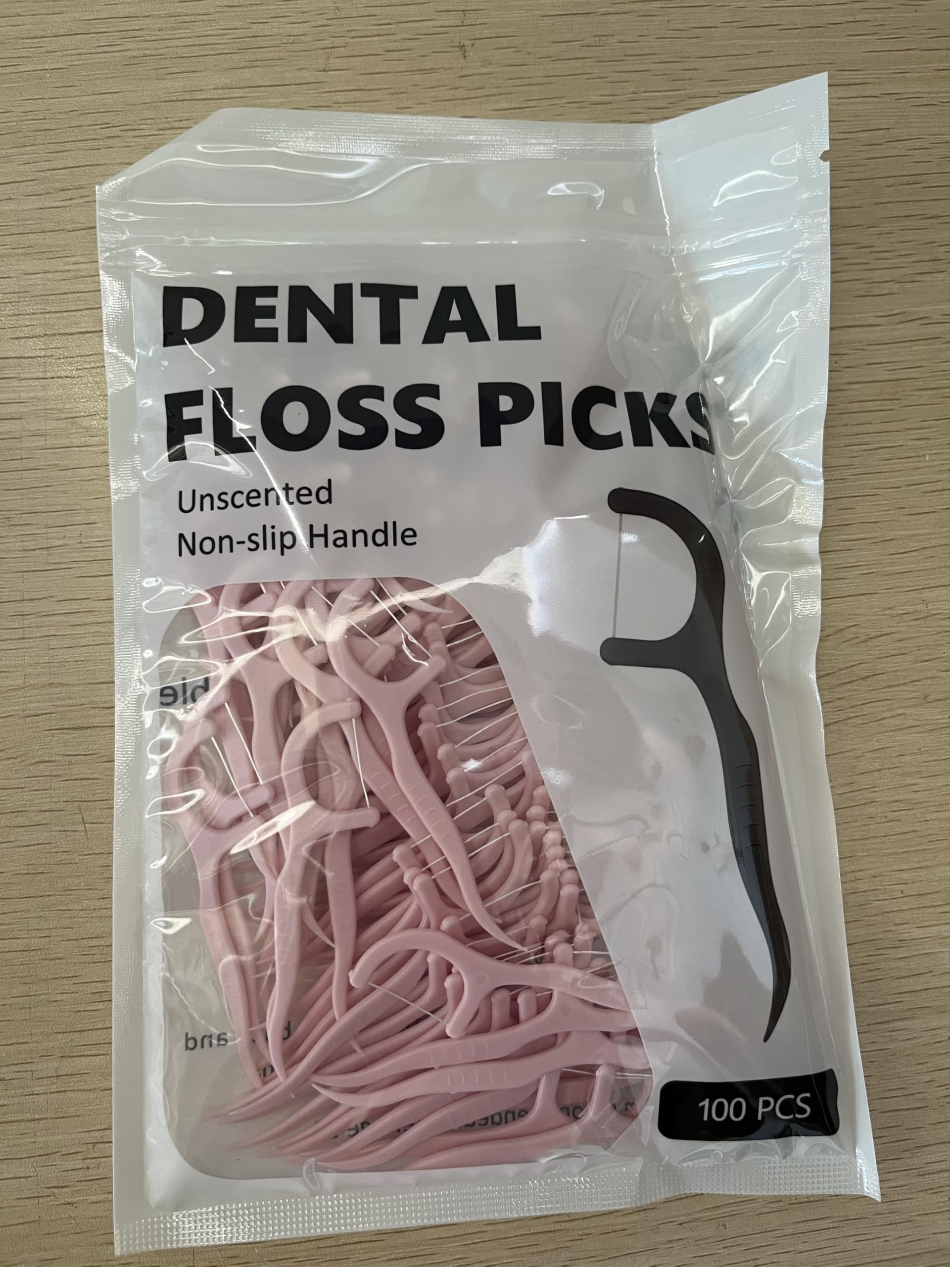 Portable floss picks measuring 2.95 x 0.63 inches