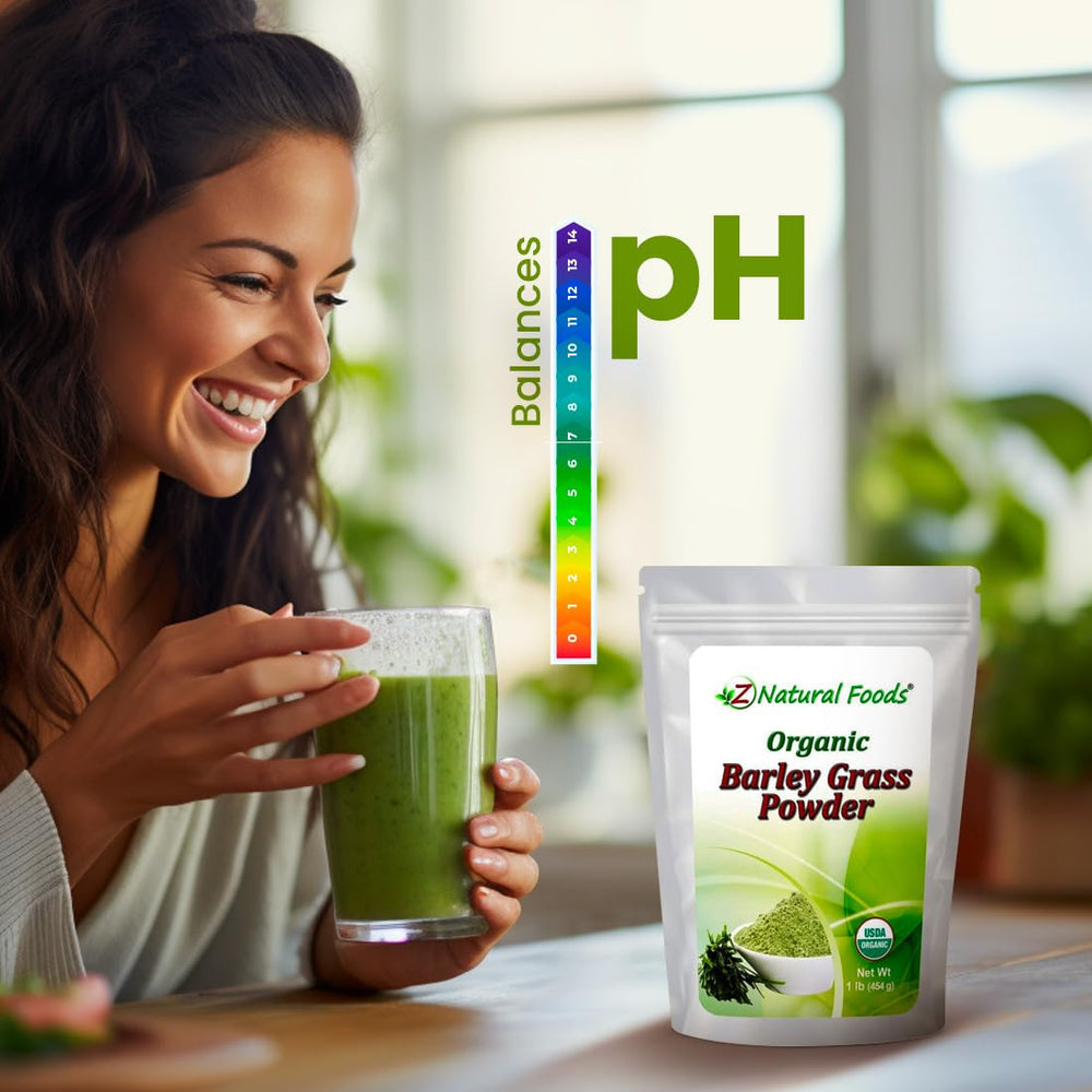 Glass of juice with barley grass powder mixed in