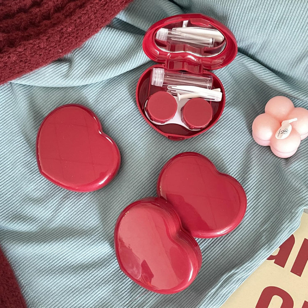 Open view of red heart-shaped BEDARTIST contact lens case